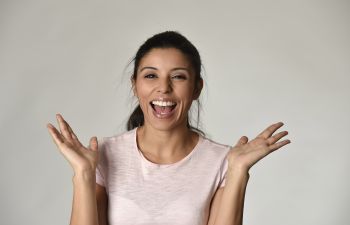 Happy smiling woman with pink shirt