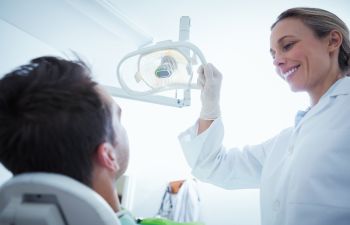 Patient in Dental Chair Being Examined, Lawrenceville, GA