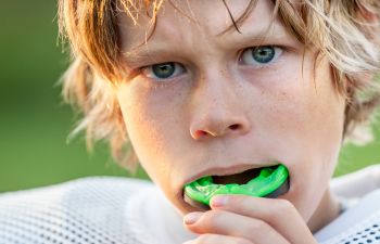 Boy Earring a Mouthguard For Sports, Lawrenceville, GA